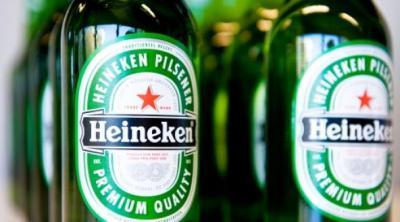 Winst Heineken gehalveerd - Heineken steeds minder populair